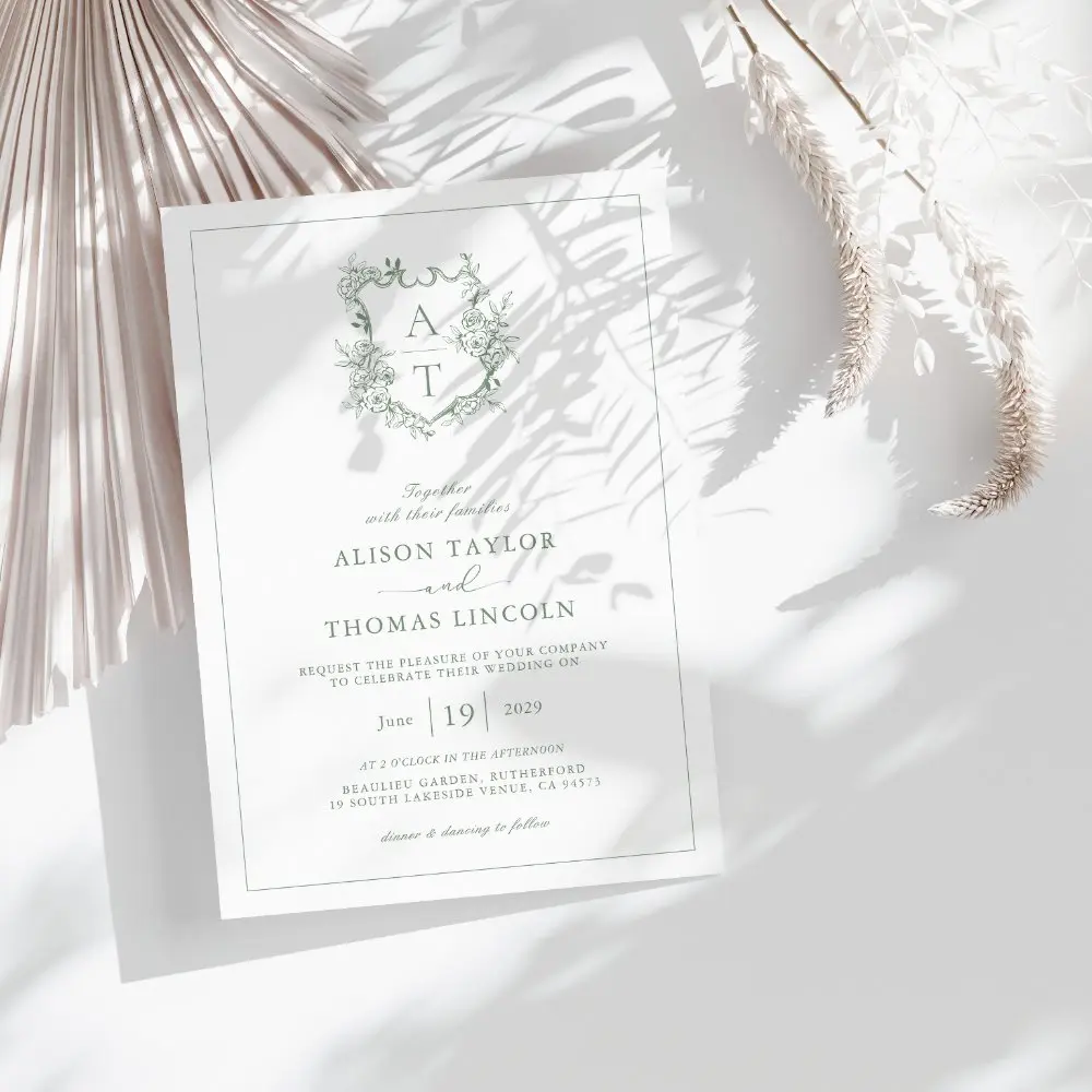 formal_crest_sage_green_monogram_wedding_invitation-r_vsawo3_1000.webp